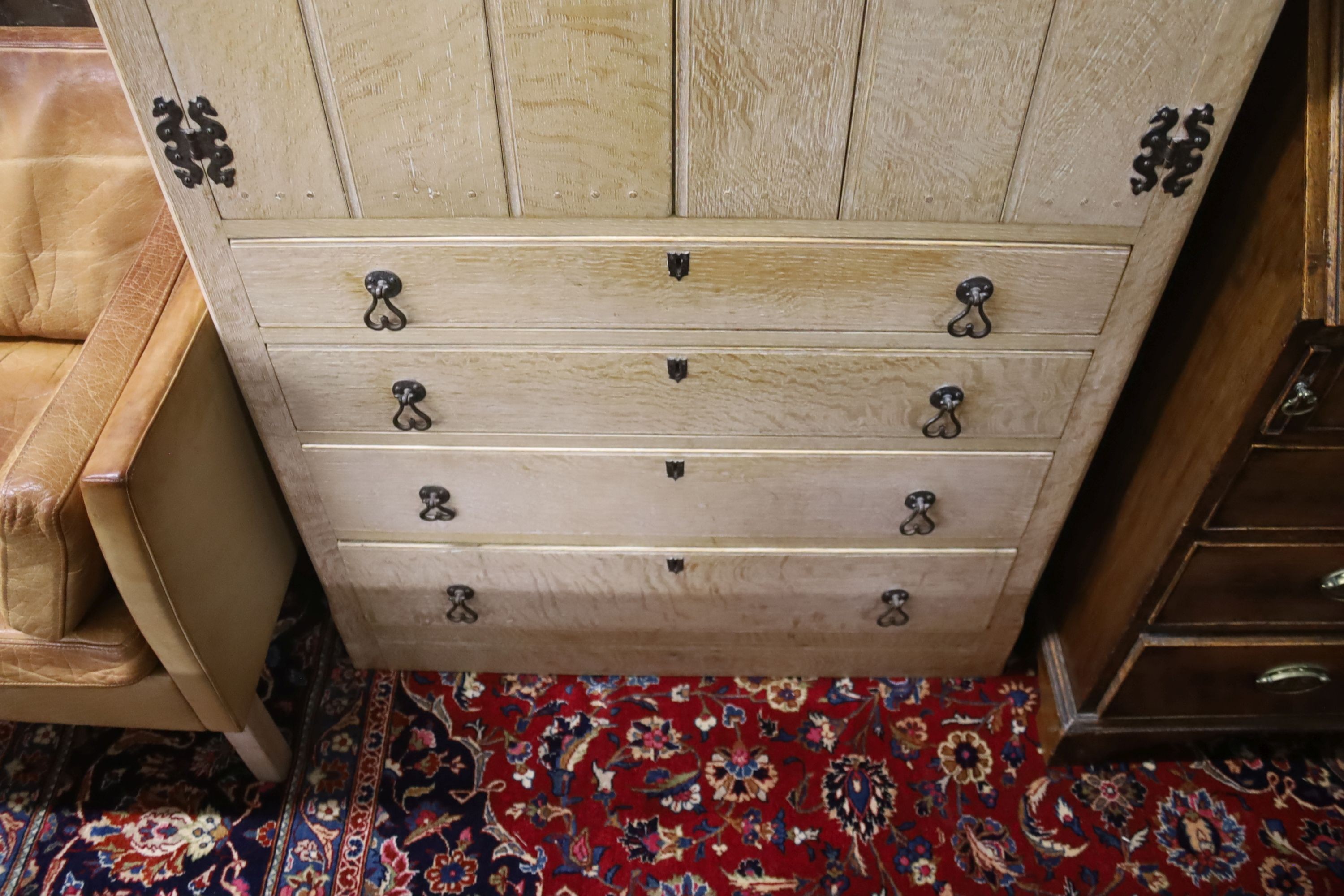 A 1930's bleached oak four drawer cabinet, width 90cm, depth 46cm, height 137cm